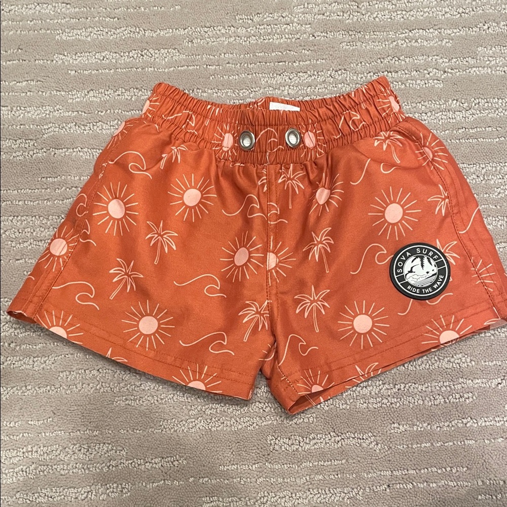 *5 for $20* Shop Sova rust Swim Shorts size 12-24 months